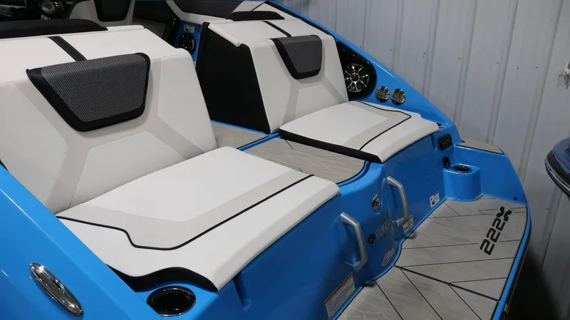 Slide: The Image of 2023 Yamaha Boats 222XD interior with blue and white seating, modern design. - 29