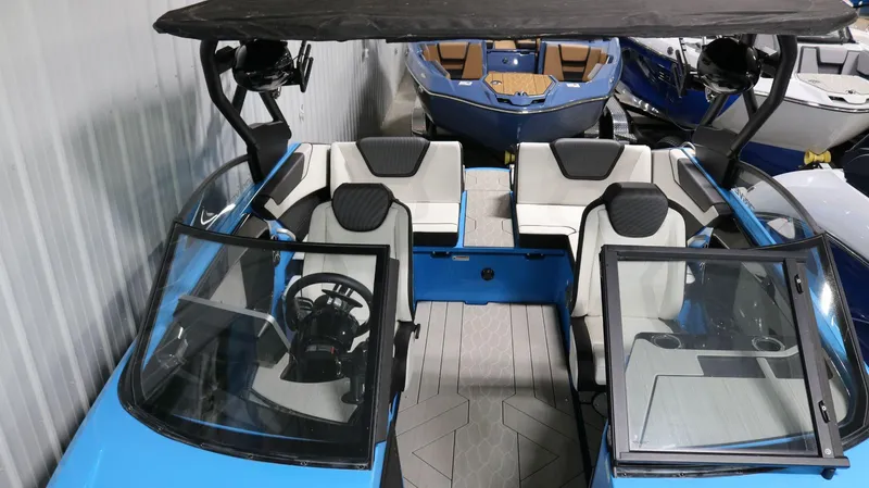 Slide: The Image of 2023 Yamaha Boats 222XD interior with modern seating and sleek design. - 9