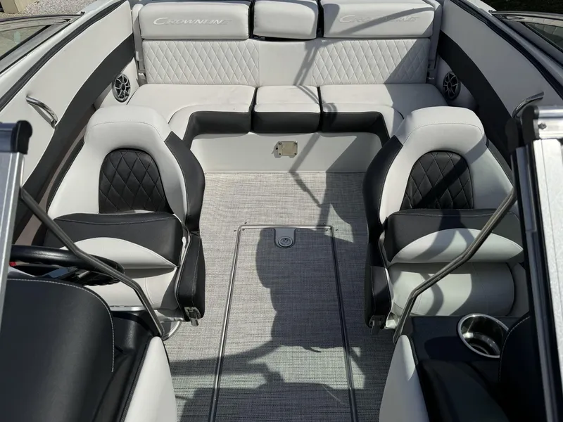 Slide: The Image of 2024 Crownline 240SS boat interior with luxurious seating and modern design. - 23