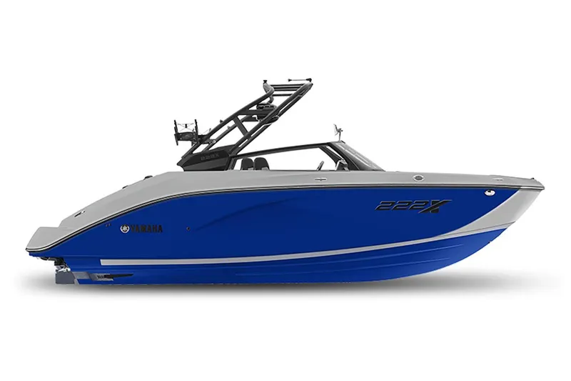 Slide: The Image of 2024 Yamaha Boats 222XE, sleek blue and gray design, side view. - 7