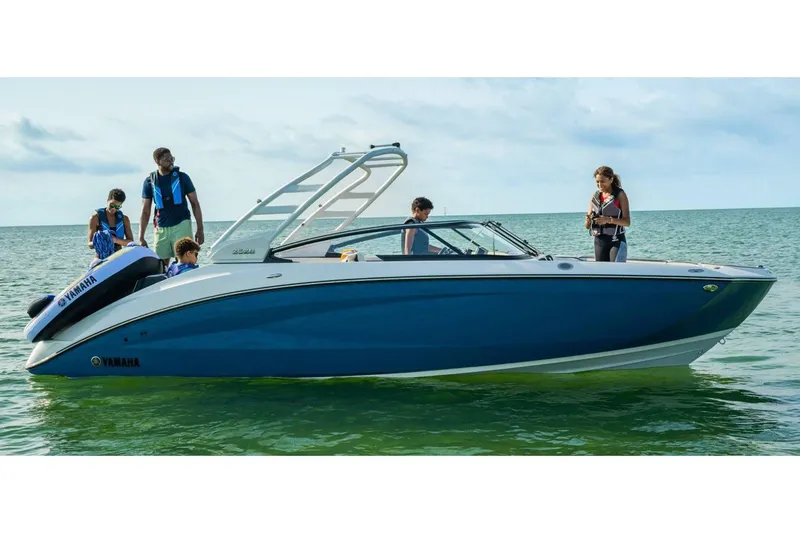 Slide: The Image of 2024 Yamaha Boats 252S on water with passengers enjoying the ride. - 17