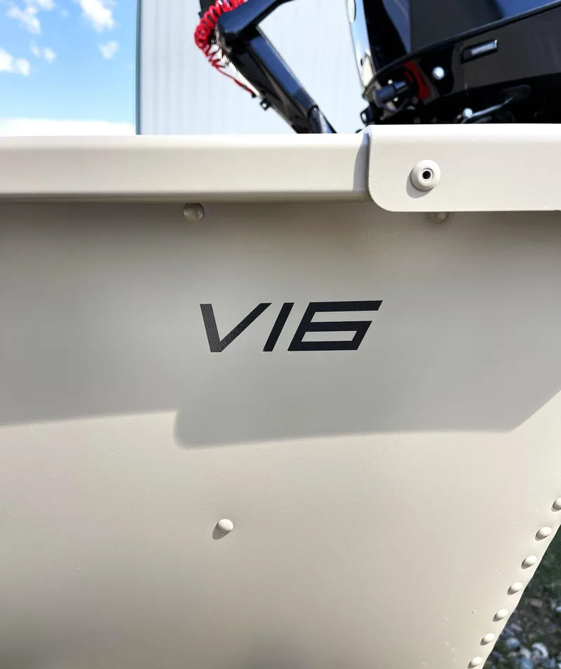 Slide: The Image of 2024 Alumacraft V-16 Tiller boat, close-up of model name on hull. - 10