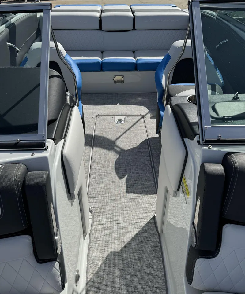 Slide: The Image of 2024 Crownline 220SS boat interior with modern seating and sleek design. - 6