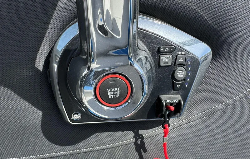 Slide: The Image of 2024 Crownline 220SS boat control panel with start/stop button and throttle controls. - 9