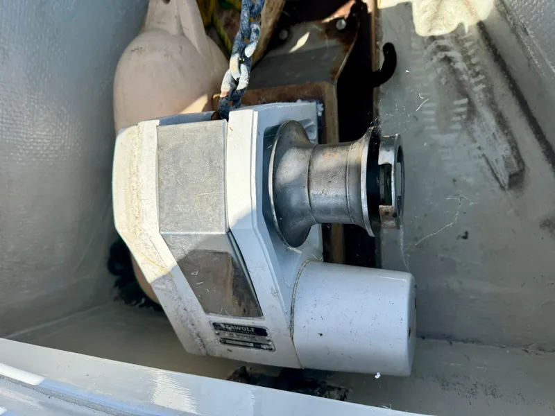 Slide: The Image of Anchor winch on 1979 Islander IP Peterson 40 sailboat deck. - 34