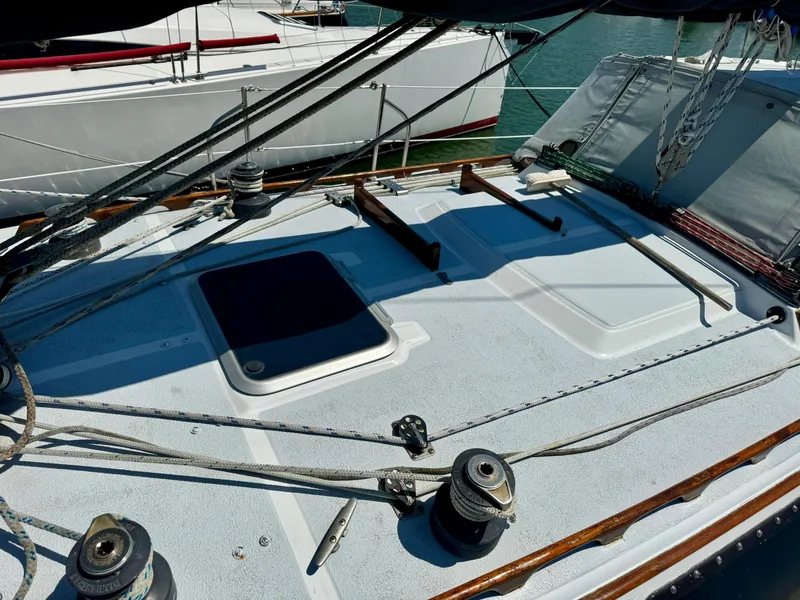 Slide: The Image of Deck of 1979 Islander IP Peterson 40 sailboat with winches and rigging. - 36