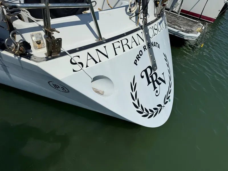 Slide: The Image of Bow of 1979 Islander IP Peterson 40 sailboat docked in San Francisco marina. - 43