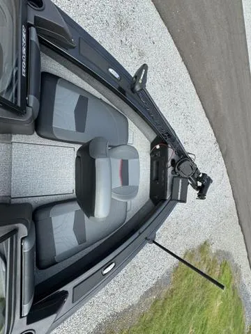 Slide: The Image of 2023 Tracker V-19 WT TARGA boat interior with gray seating and control panel. - 10