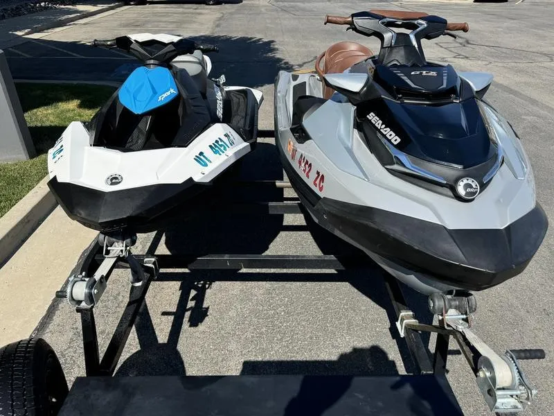 Slide: The Image of 2019 Sea-Doo GTX 300 and Spark 2UP jet skis on a trailer. - 6