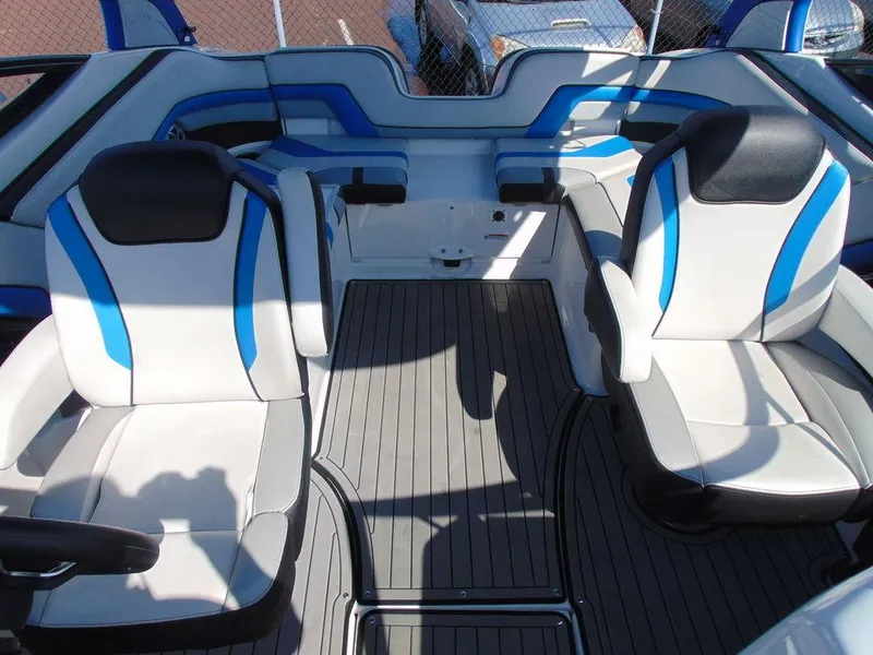 Slide: The Image of 2018 Yamaha WaveRunner 242X E-Series interior with blue and white seating. - 10