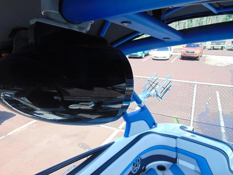 Slide: The Image of 2018 Yamaha WaveRunner 242X E-Series interior with blue accents and speaker system. - 12