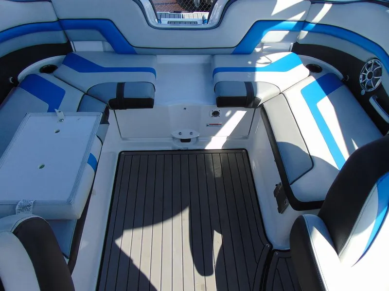 Slide: The Image of 2018 Yamaha WaveRunner 242X E-Series interior with blue and gray seating. - 13