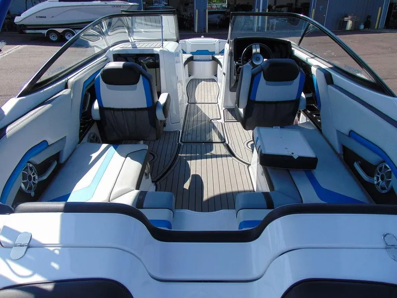 Slide: The Image of 2018 Yamaha WaveRunner 242X E-Series interior with blue and white seating. - 4