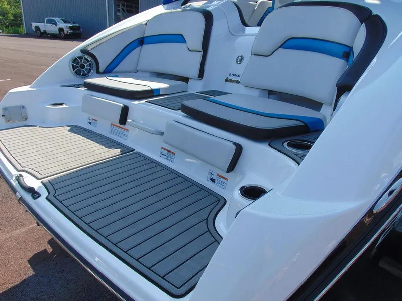 Slide: The Image of 2018 Yamaha WaveRunner 242X E-Series rear seating and deck, featuring blue and gray accents. - 5