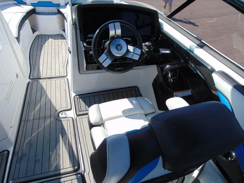Slide: The Image of 2018 Yamaha WaveRunner 242X E-Series cockpit with sleek steering and modern controls. - 6