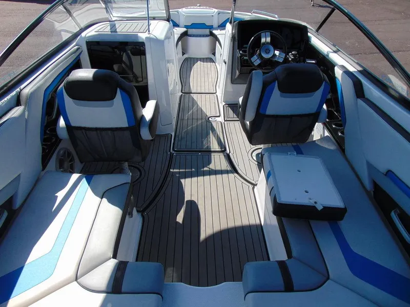 Slide: The Image of 2018 Yamaha WaveRunner 242X E-Series interior with sleek seating and modern dashboard. - 8