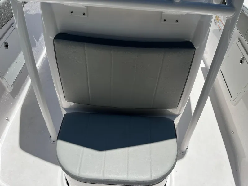 Slide: The Image of 2022 Aquasport 2300 Center Console boat seat, gray upholstery, white frame. - 27