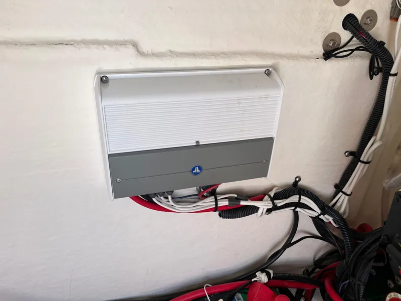 Slide: The Image of Electrical panel inside 2022 Aquasport 2300 Center Console boat. - 38