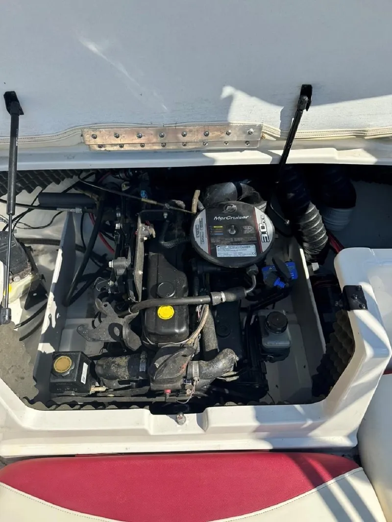 Slide: The Image of 2014 Tahoe Q4i boat engine compartment with MerCruiser engine. - 6