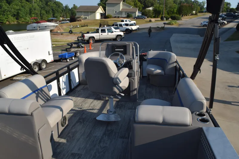 Slide: The Image of 2025 Angler Qwest 8524 ALL SPORT pontoon boat with spacious seating and modern design. - 23