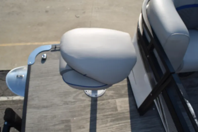 Slide: The Image of Angler Qwest 8524 ALL SPORT 2025 boat seat on deck, gray upholstery. - 27