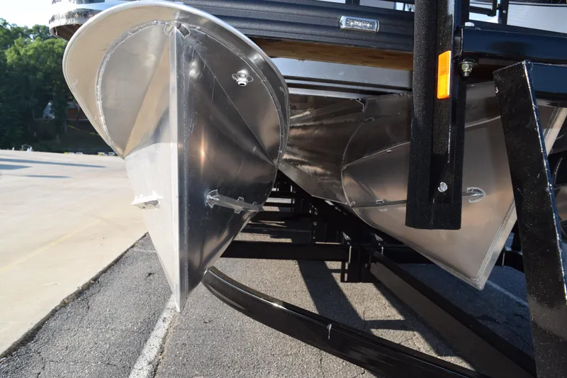 Slide: The Image of Close-up of 2025 Angler Qwest 8524 ALL SPORT pontoon boat hulls on trailer. - 29