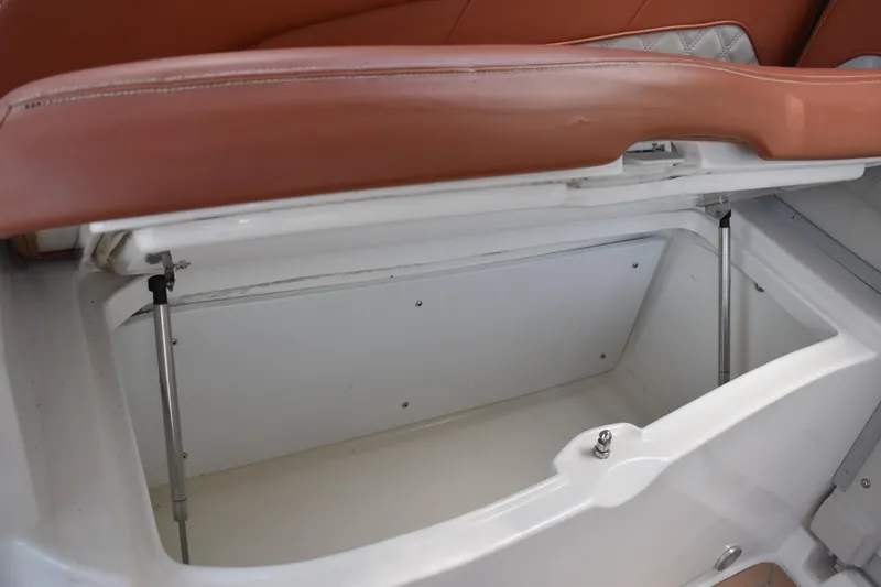 Slide: The Image of Open storage compartment in 2018 Pronautica 34 boat with cushioned seating. - 20