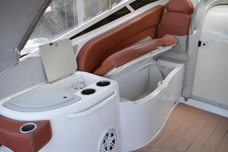 Slide: The Image of 2018 Pronautica 34 boat interior with seating and storage compartments. - 5