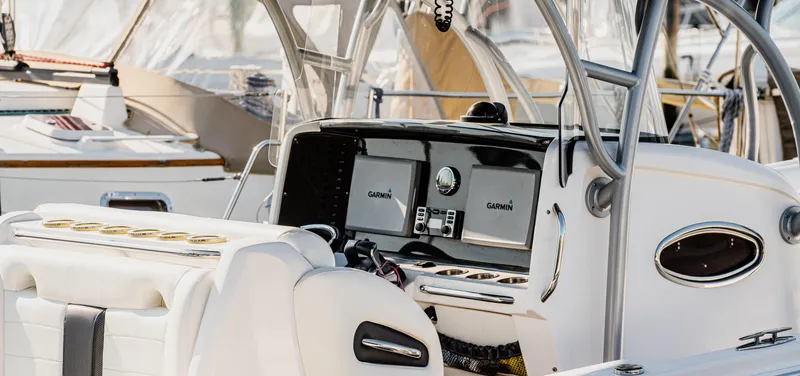 Slide: The Image of 2014 Nor-Tech 390 Sport Cuddy Center Console with advanced Garmin navigation system. - 10