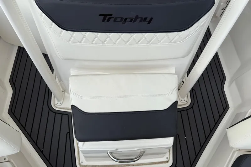 Slide: The Image of 2023 Bayliner Trophy T20CC boat seat with black and white upholstery. - 13