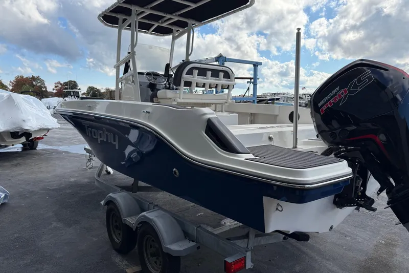 Slide: The Image of 2023 Bayliner Trophy T20CC boat on trailer with Mercury Pro XS engine. - 4