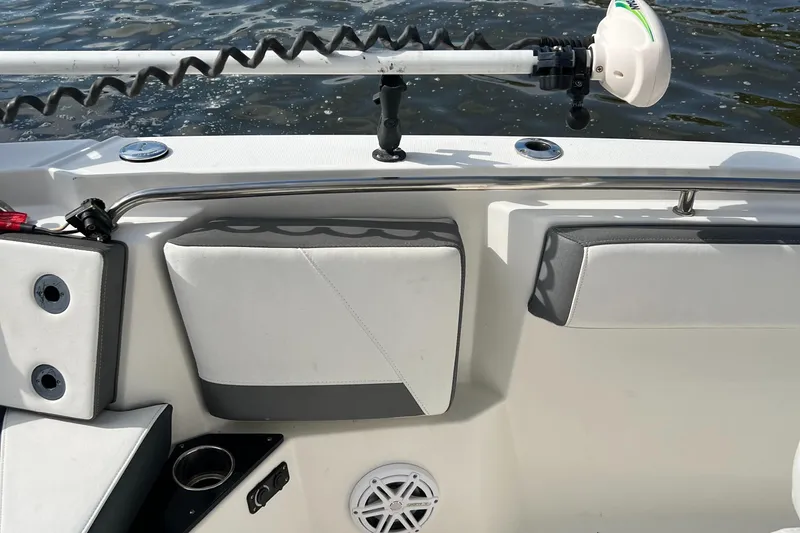 Slide: The Image of 2019 Blackfin 242 CC boat interior with seating and rod holder. - 14