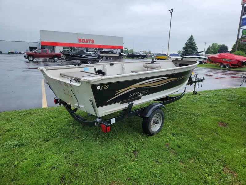 Slide: The Image of Smoker Craft 150 Stinger 2003 - 3