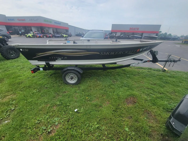 Slide: The Image of Smoker Craft 150 Stinger 2003 - 4