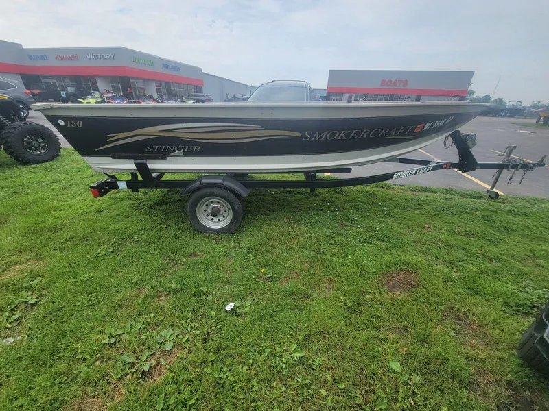 Slide: The Image of Smoker Craft 150 Stinger 2003 - 7