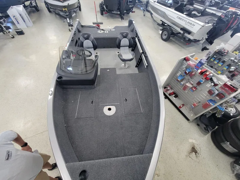 Slide: The Image of 2024 Crestliner 1750 HAWK SC JS fishing boat interior in showroom. - 10