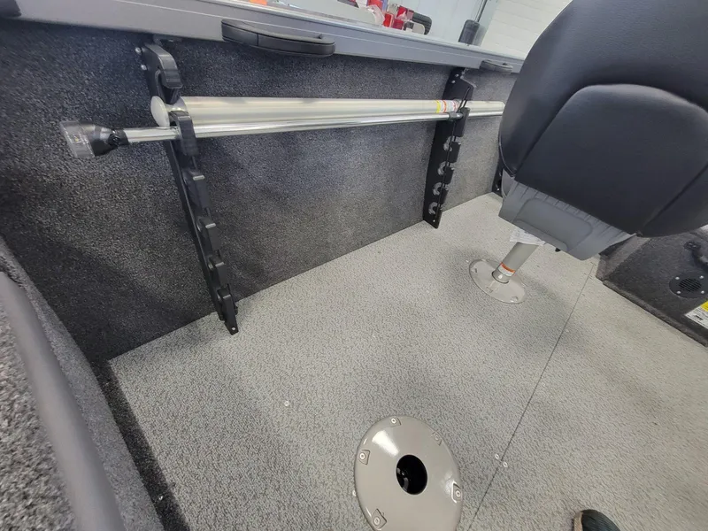 Slide: The Image of 2024 Crestliner 1750 HAWK SC JS interior with rod holder and seat. - 13