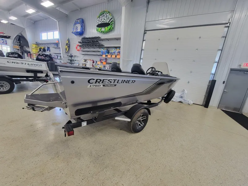 Slide: The Image of 2024 Crestliner 1750 HAWK SC JS boat displayed in showroom. - 3