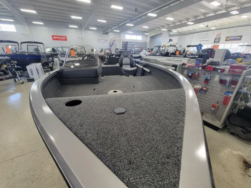 Slide: The Image of 2024 Crestliner 1750 HAWK SC JS boat displayed in showroom. - 7
