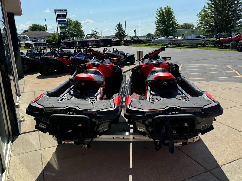 Slide: The Image of Two 2019 Sea-Doo RXT-X 300 jet skis parked on a trailer. - 5