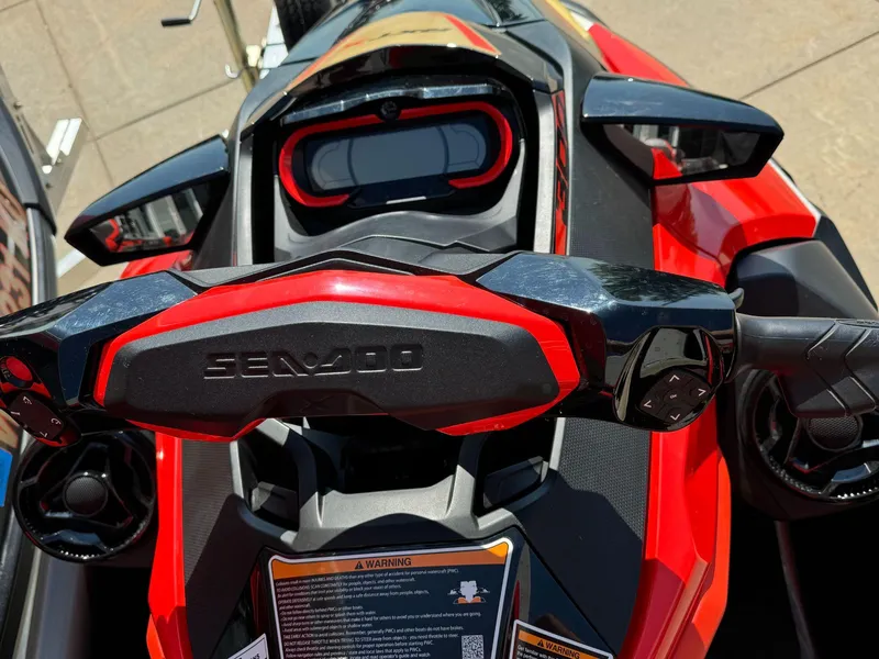 Slide: The Image of 2019 Sea-Doo RXT-X 300 iBR with sound system, close-up of handlebars and controls. - 6