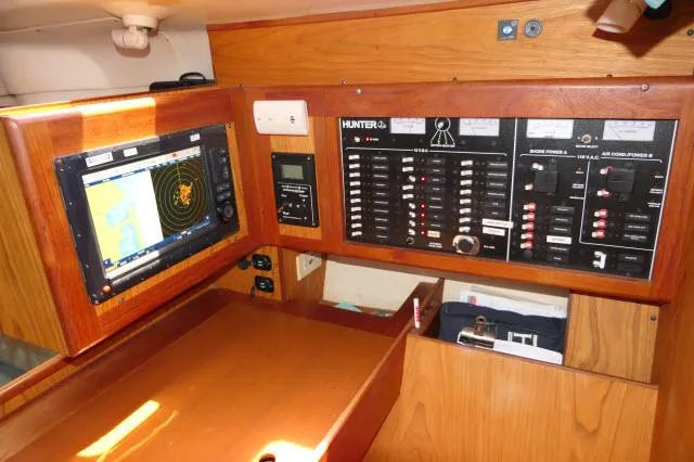 Slide: The Image of Control panel of a 2000 Hunter 460 sailboat with navigation equipment. - 18