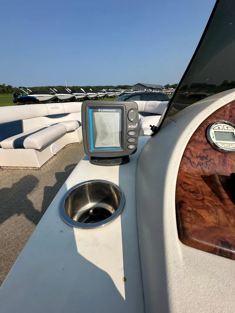 Slide: The Image of 2008 Misty Harbor 2085GM Grand Mistique boat interior with navigation system and seating. - 9