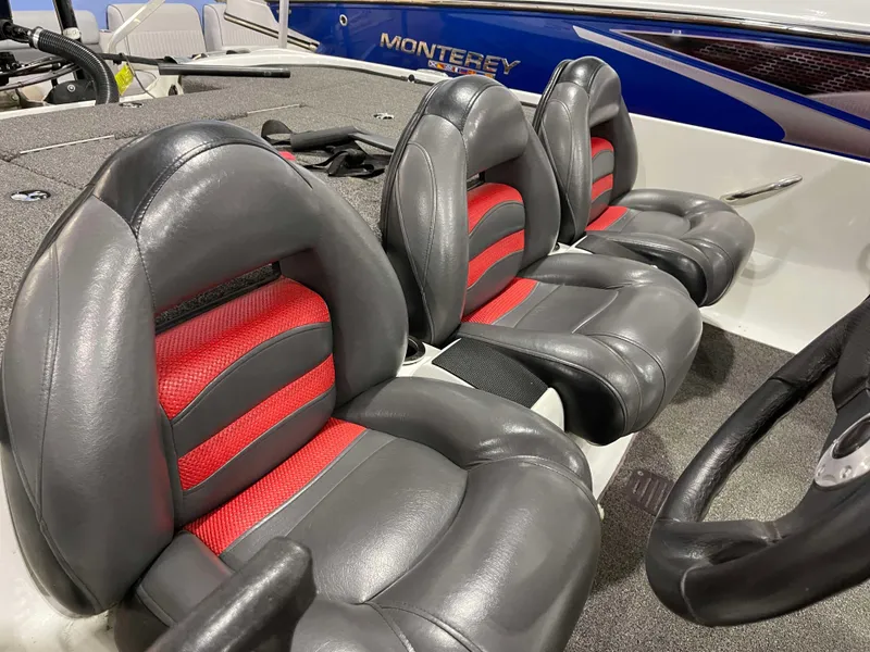 Slide: The Image of 2011 Nitro Z-7 boat seats with red and black upholstery, featuring Monterey branding. - 4