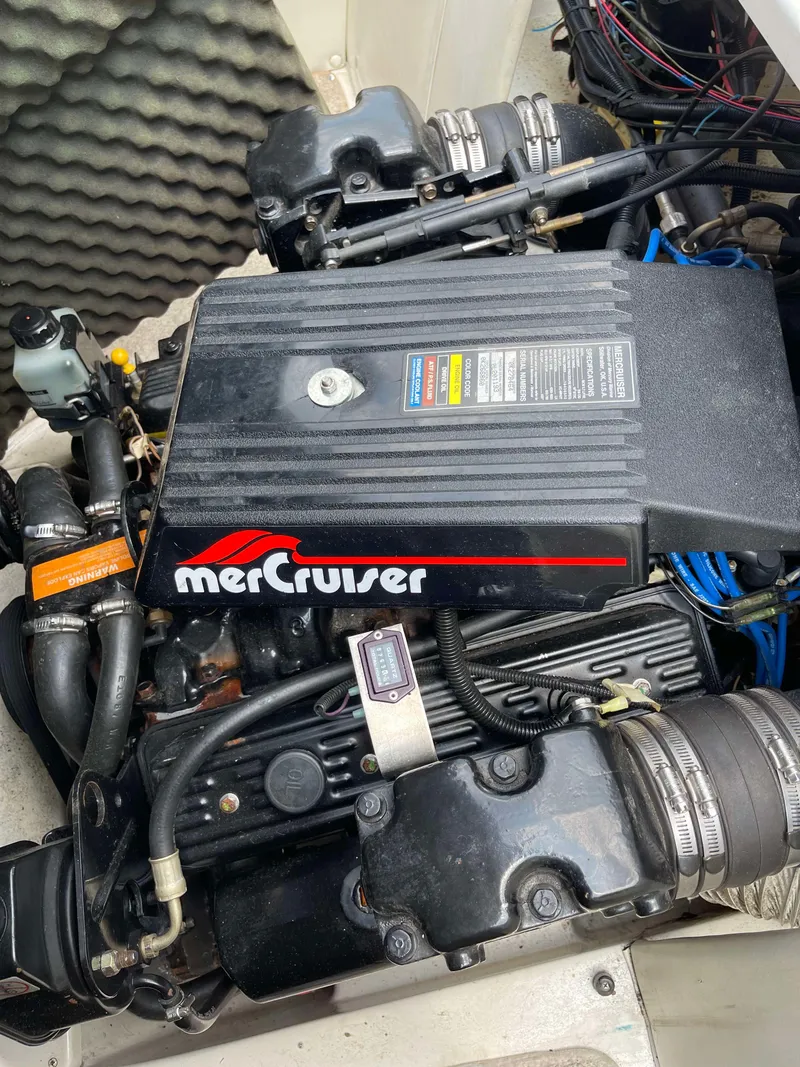 Slide: The Image of MerCruiser engine in 1998 Rinker 212 Captiva Cuddy boat. - 17