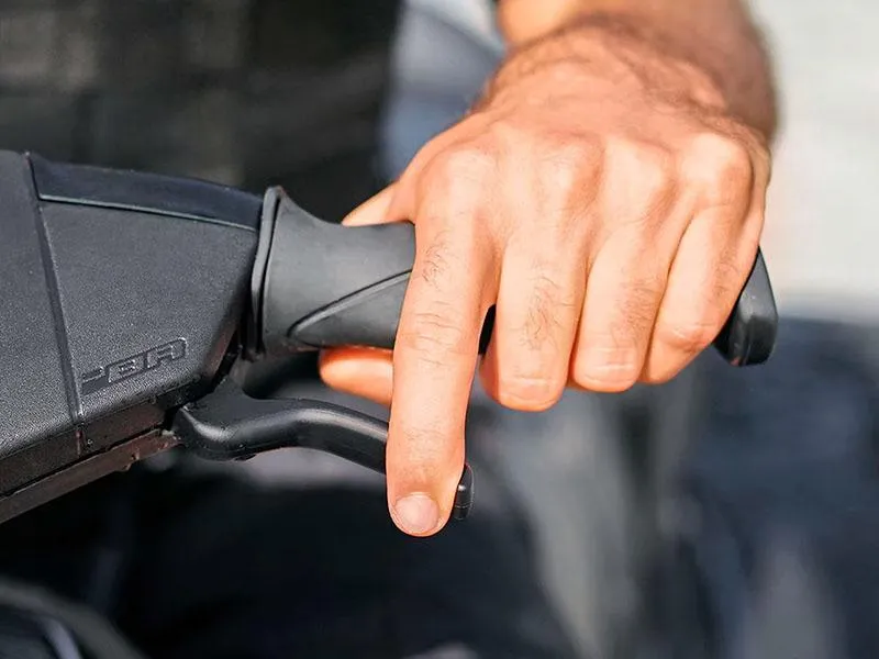 Slide: The Image of Close-up of hand operating 2024 Sea-Doo GTX 230 iBR iDF throttle. - 7