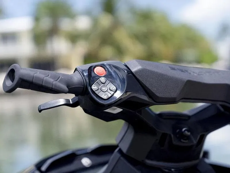 Slide: The Image of Close-up of 2024 Sea-Doo GTX 230 iBR iDF handlebar controls. - 9