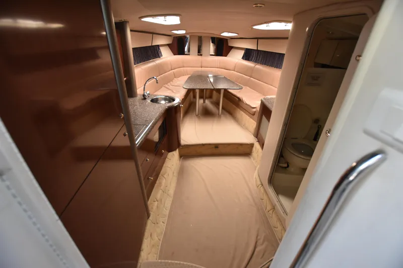 Slide: The Image of Interior of 2004 Formula 400 Super Sport yacht with kitchenette and seating area. - 15