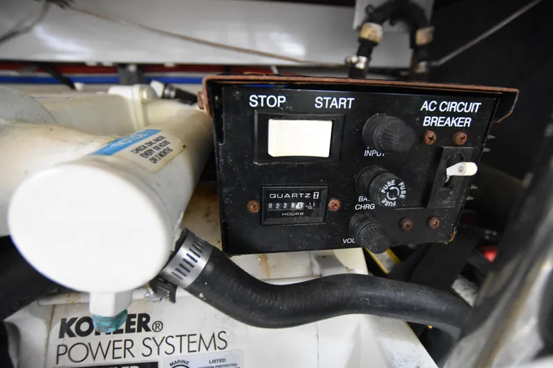 Slide: The Image of Control panel of a 2004 Formula 400 Super Sport boat with Kohler power systems. - 36