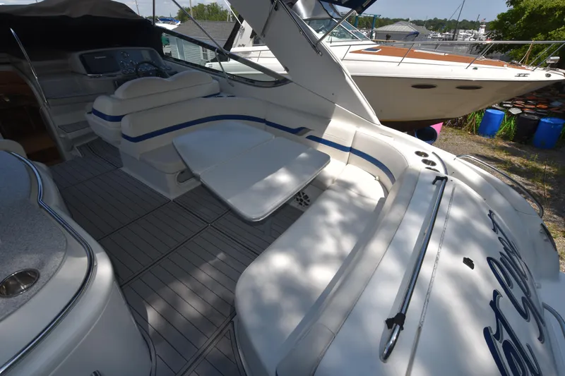 Slide: The Image of 2004 Formula 400 Super Sport yacht interior with seating and table. - 6